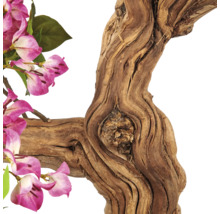 Kunstmatige knoestige tak met roze en witte bloemen en groene bladeren.