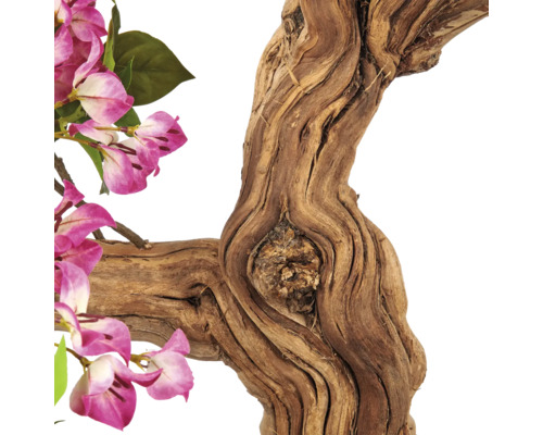 Kunstmatige knoestige tak met roze en witte bloemen en groene bladeren.