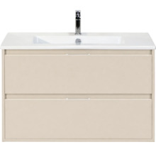 Beige wastafelmeubel met twee laden, witte wastafel en kraan.