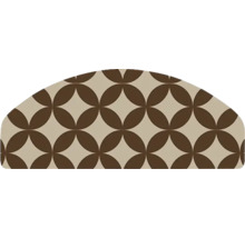 Halfronde trapmat met geometrisch cirkelpatroon.