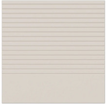 Beige keramische wandtegel met horizontale lijnstructuur aan de bovenzijde en een glad oppervlak aan de onderzijde.