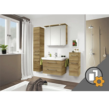 Moderne badkamermeubelset in eikenlook met wastafelonderkast, spiegelkast en kasten in een lichte badkamer met montageservice.