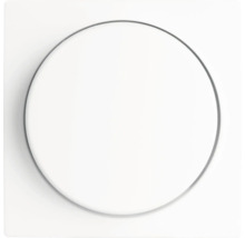 Ronde lichtschakelaar of dimmerknop van kunststof op een vierkante afdekplaat.
