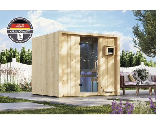 Moderne Karibu tuinsauna van hout met glazen voorkant op een terras met tuinmeubelen, inclusief fabrieksgarantie en kwaliteitszegel.