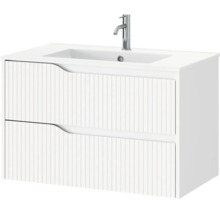 Wit wastafelmeubel met twee laden, geribbelde voorkant en geïntegreerde wastafel inclusief chromen kraan.