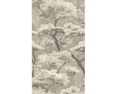 Vliesbehang met een artistiek boommotief in Aziatische stijl, lichte bloesems aan donkere takken op een gestructureerde achtergrond.