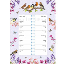 Wandkalender voor juli 2027 met vogel en bloemen motief, spiraalgebonden ontwerp met weekoverzicht.