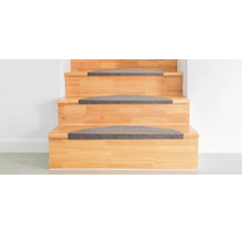 Trapmatten op een houten trap