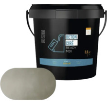 Een emmer Beton Cire Ready Mix met een ovaal voorbeeldstukje in een lichte oppervlakteoptiek.