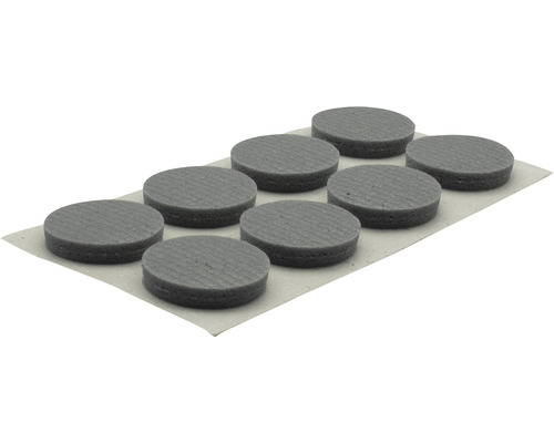 Negen ronde viltglijders op draagpapier