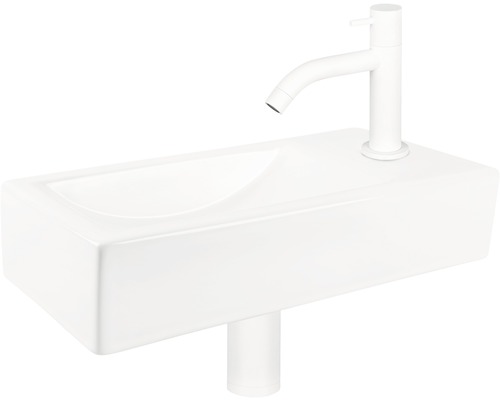 Wastafel van keramiek met kraan