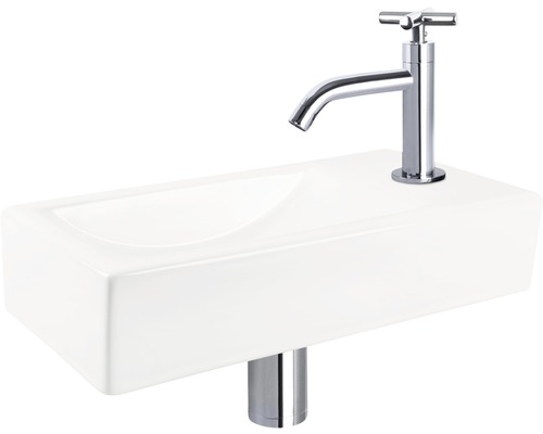 Keramische wastafel met kraan voor de badkamer.