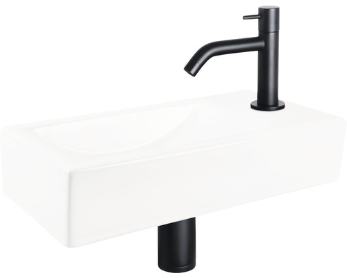 Opzetwastafel van keramiek met zwarte kraan