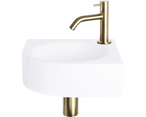 Witte opzetwastafel met goudkleurige kraan en afvoergarnituur