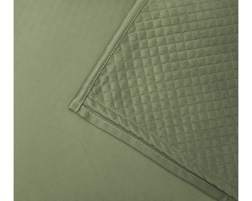 Close-up van een gewatteerde sprei met vierkant patroon