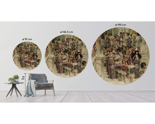 Wanddecoratie met schilderij in drie verschillende afmetingen naast fauteuil en tafel