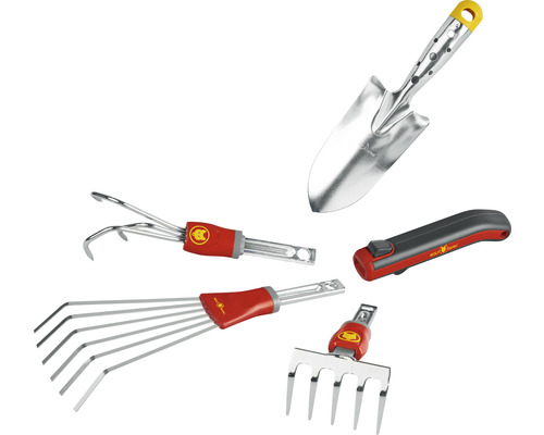 Diverse tuingereedschappen zoals een schep, een onkruidsteker, een bladhark, een cultivator en een mes.