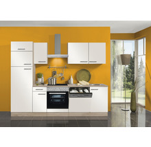 Moderne keuken met witte kasten, afzuigkap en elektrische apparaten voor een gele muur