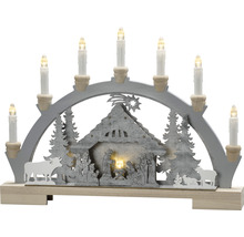 Kerstkandelaar met kerststal en zeven kaarsen