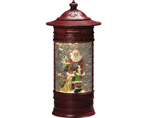 Decoratieve sneeuwbol met kerstmanfiguur in een brievenbusvorm