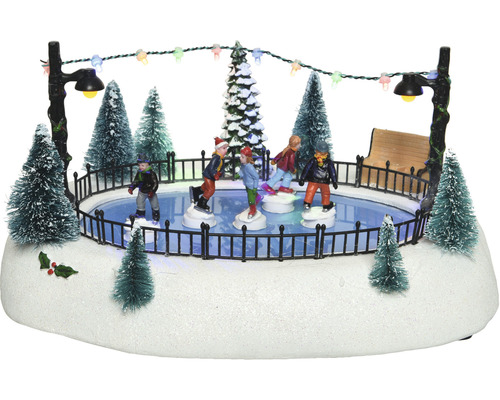 Wintertafereel met ijsbaan, figuren en verlichting als decoratie