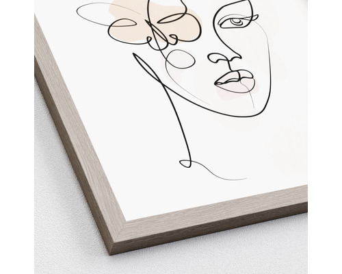 Ingelijste afbeelding met een abstracte weergave van een vrouw