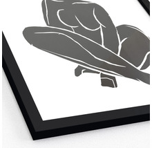Ingelijste poster met abstracte afbeelding van een hurkende persoon