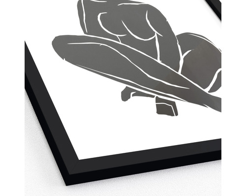 Ingelijste poster met abstracte afbeelding van een hurkende persoon