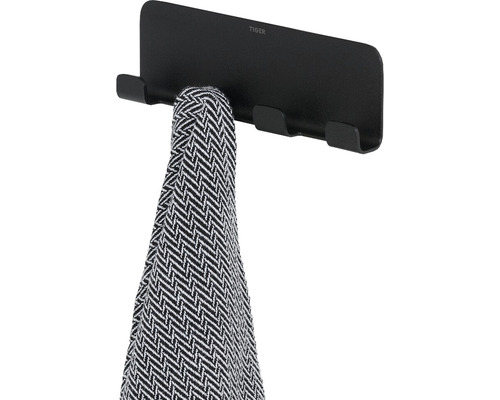 Tiger Logo handdoekhouder met een handdoek