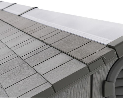 Detailopname van het dak van een tuinhuis met dakpannenstructuur