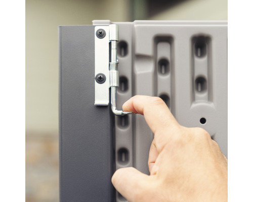 Detailopname van een kastgrendel met handbediening