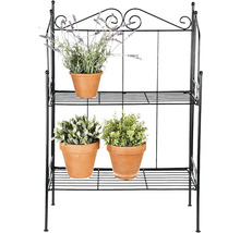 Metalen plantenrek met drie terracotta potten en planten