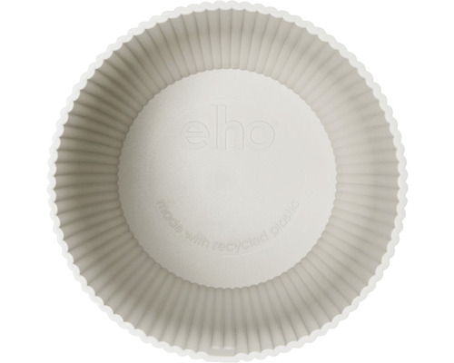 Binnenaanzicht van een ronde plantenbak van gerecycled plastic met Elho logo
