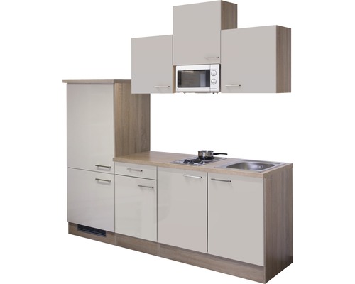 Compacte keuken met spoelbak, kookplaat, magnetron en hangkasten voor kleine ruimtes