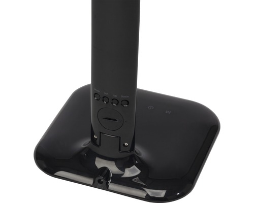 Detailaanzicht van de voet van een vloerlamp met bedieningselementen.