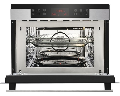 Geopende magnetron met draaiplateau en grillrooster