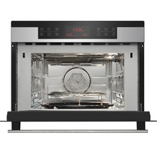 Geopende inbouwmagnetron met draaiplateau