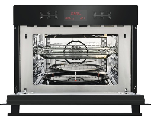 Geopende magnetron met draaiplateau en grill
