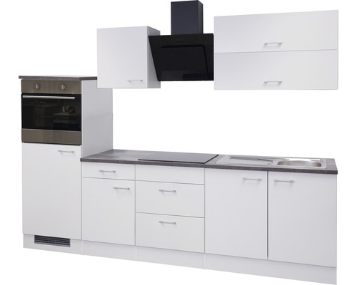 Keuken met boven- en onderkasten, oven, kookplaat, spoelbak en afzuigkap