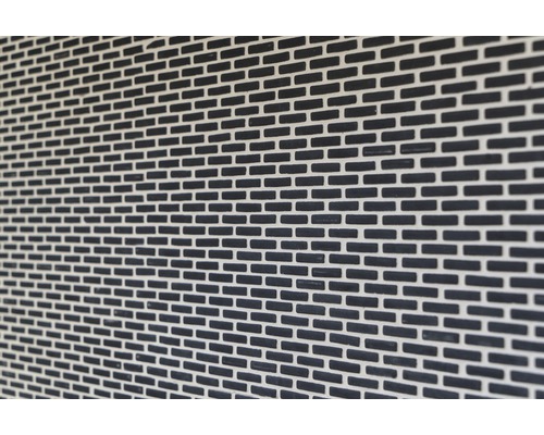 Close-up van een gevel met metselwerk