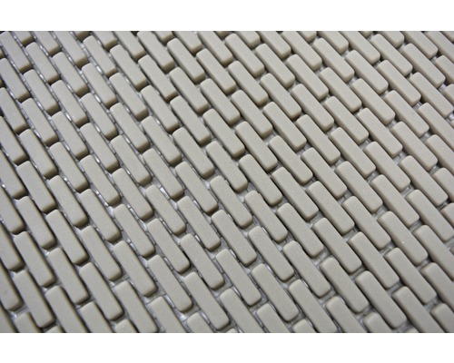 Close-up van een douchemat met een rechthoekig patroon