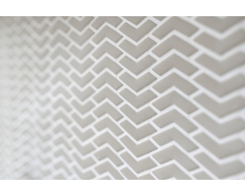 Detailaanzicht van tegels in pijldesign voor wanddecoratie