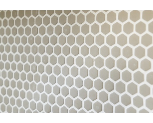 Close-up van zeshoekige tegels op een muur