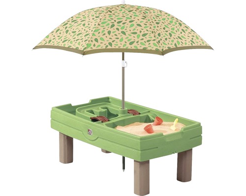 Groene zandtafel met poten en parasol met bladerenpatroon