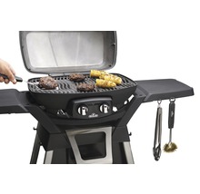 Napoleon gasbarbecue met gegrilde burgers en maïskolven op het rooster