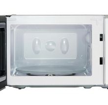 Interieur van een magnetron met draaiplateau