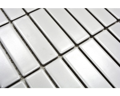 Rechthoekige tegels in visgraatpatroon