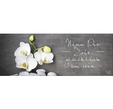Decoratie met orchidee, stenen en het opschrift ''Neem de tijd om gelukkig te zijn''