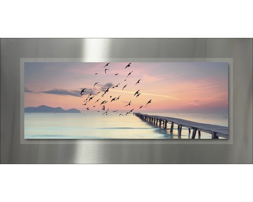 Magneetfoto met een motief van een meer, een steiger en een zwerm vogels