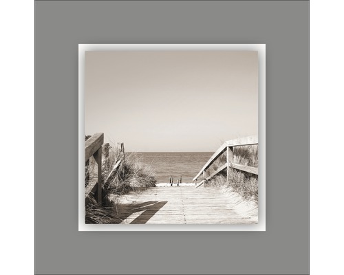 Fotografie van een houten promenade naar het strand